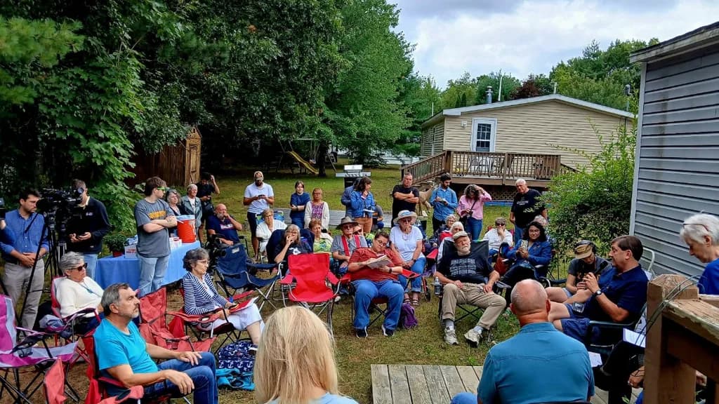 Photo: Maine Labor Climate Council and Maine Democratic Senate candidate Troy Jackson talk with mobile home residents about the issues facing working-class voters.